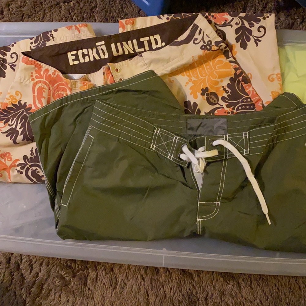 Two pairs of swim trunks, ecko unltd size 32, old navy size M